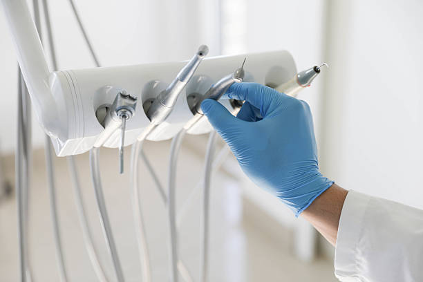 Professional Tooth Extraction technician working in Roseville, MN